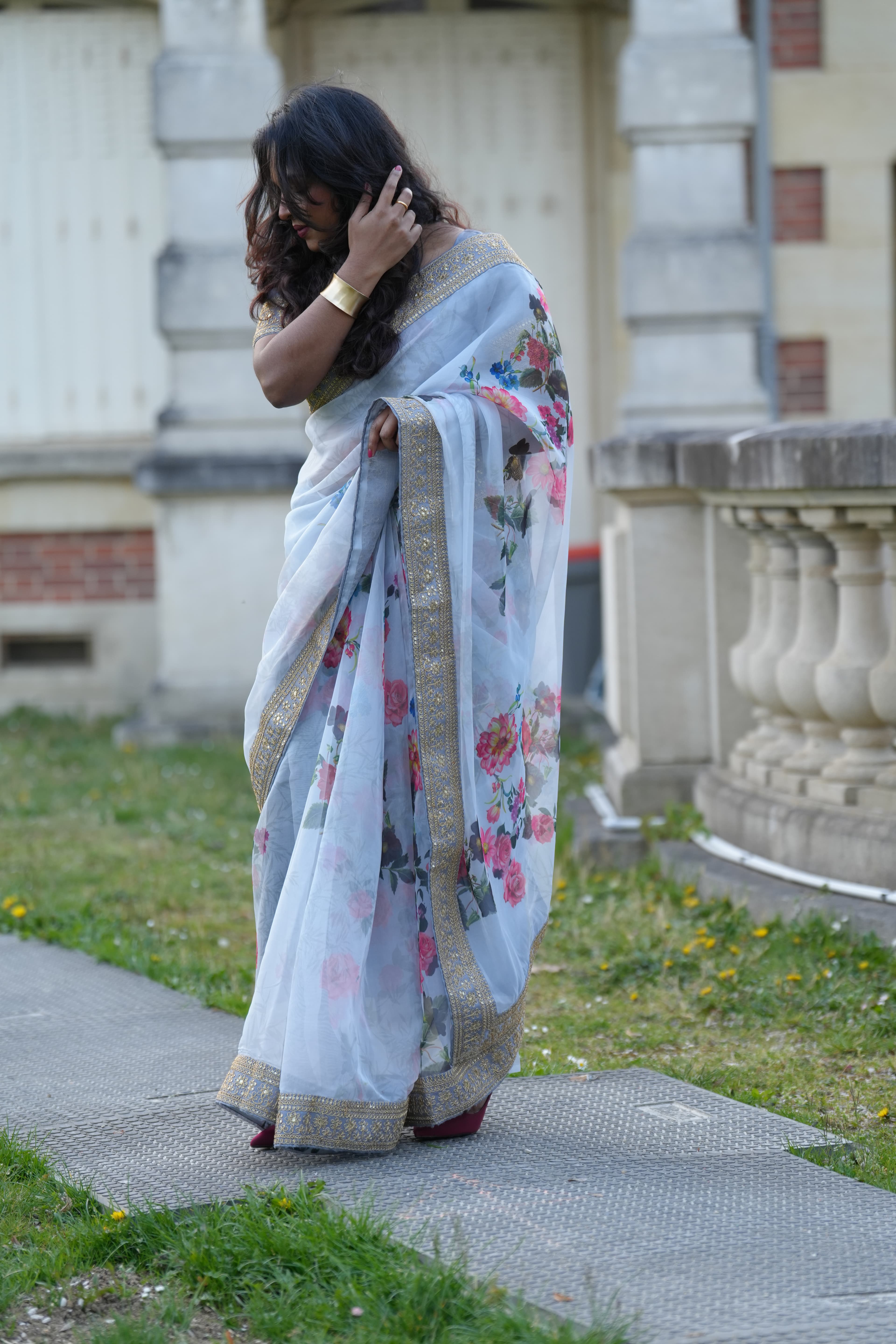 Grey saree, soft pleats folded back