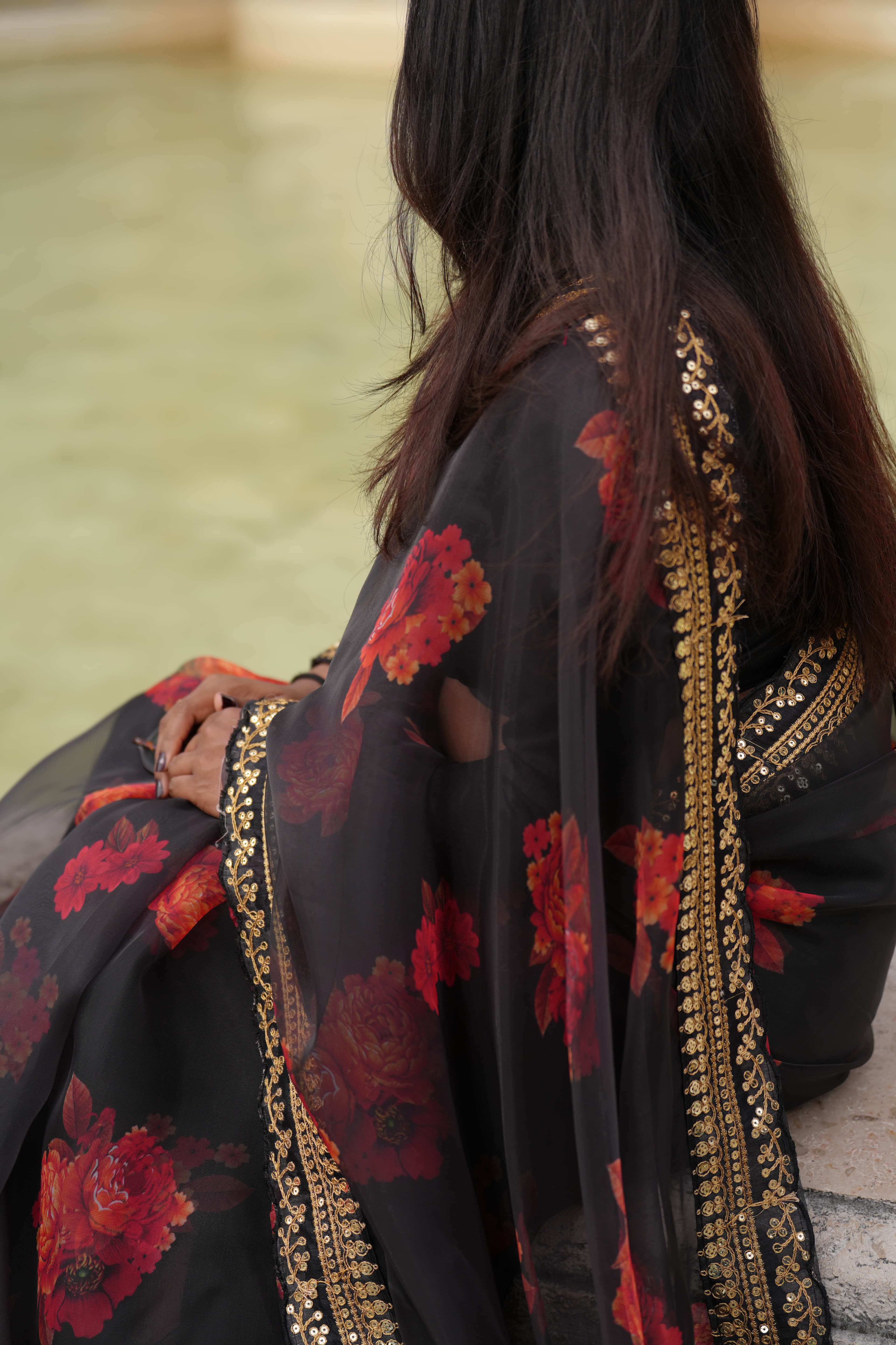 A saree, lit and waiting