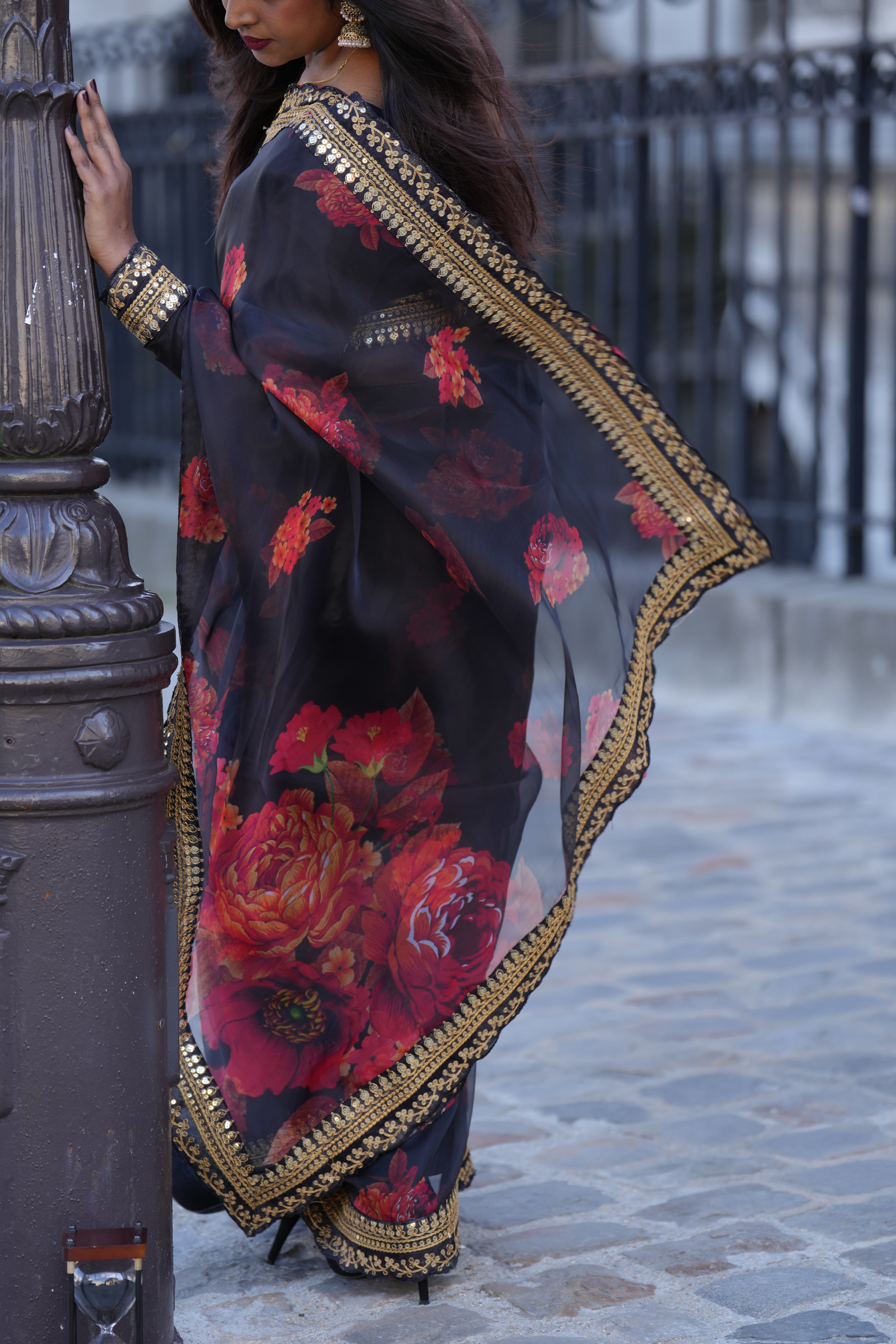 Black saree, fully draped